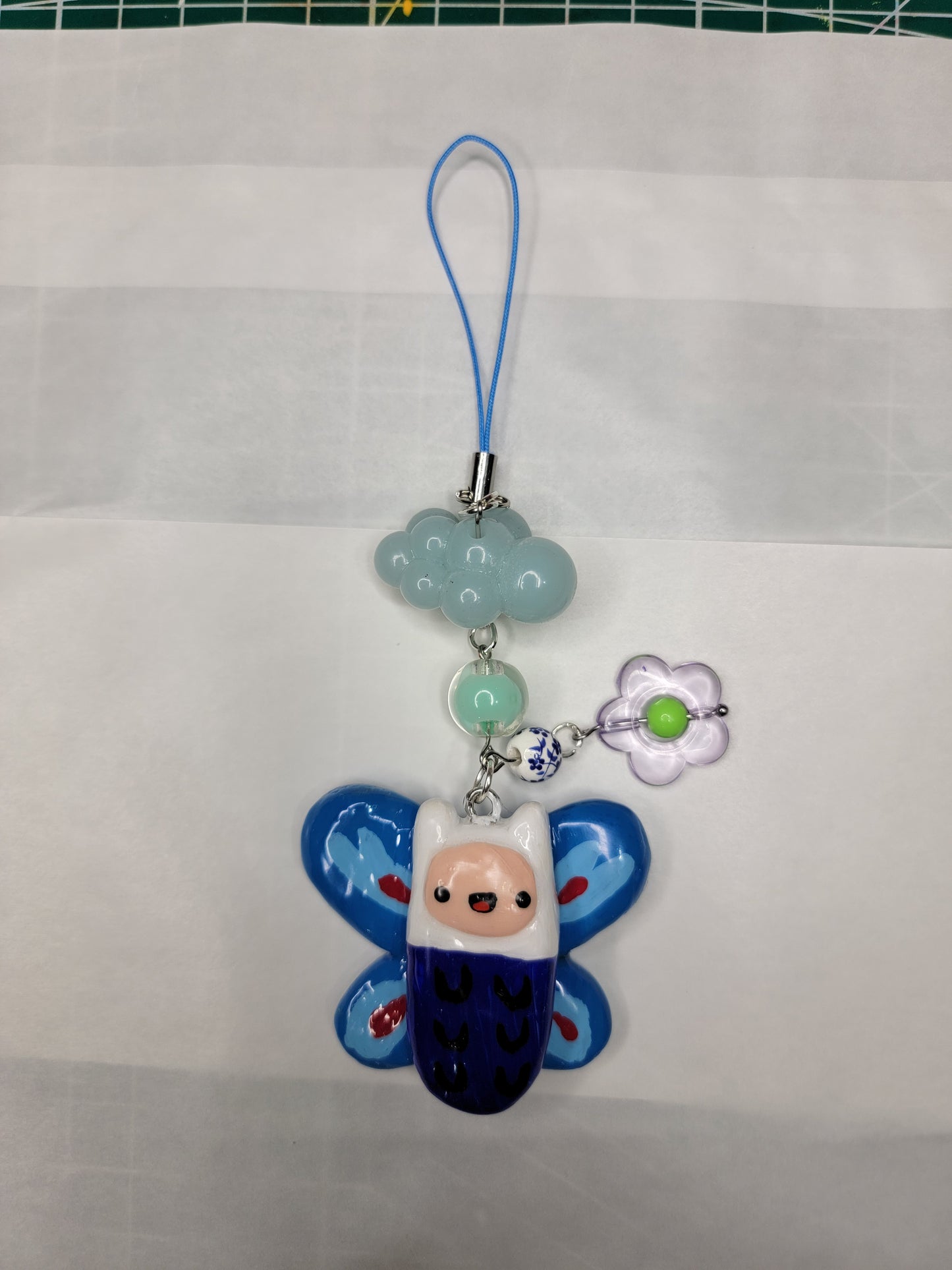 finn as a butterfly keychain