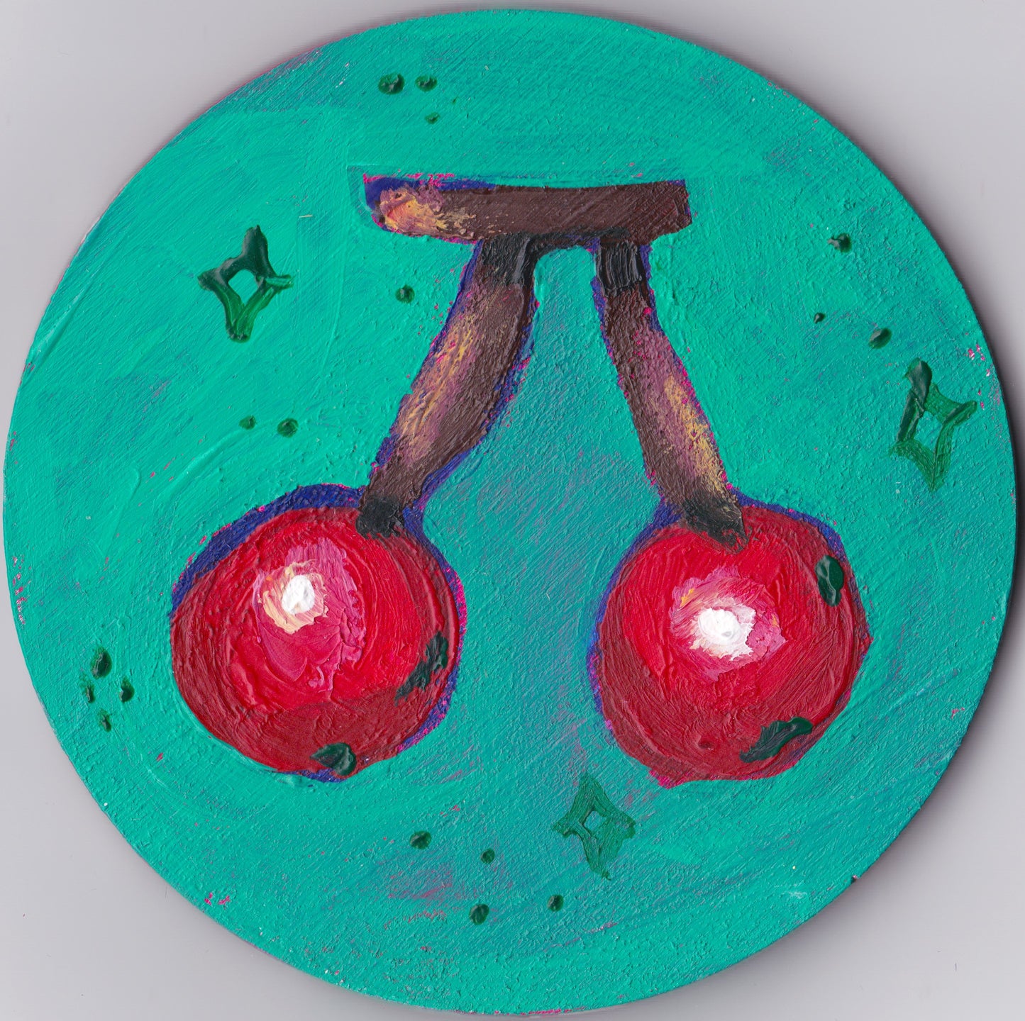 cherries on wooden plate