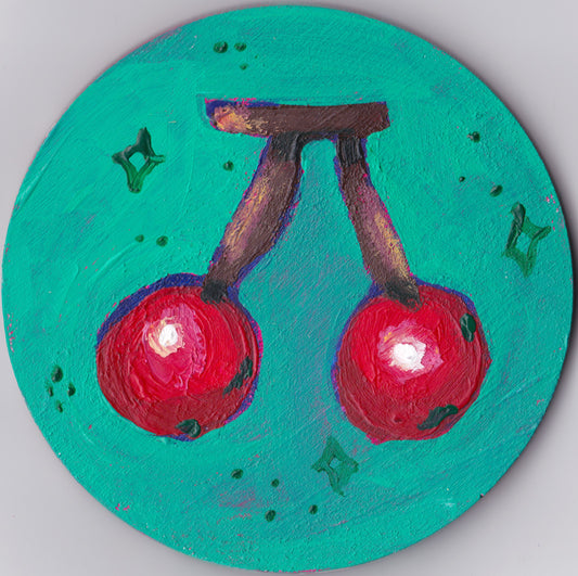 cherries on wooden plate