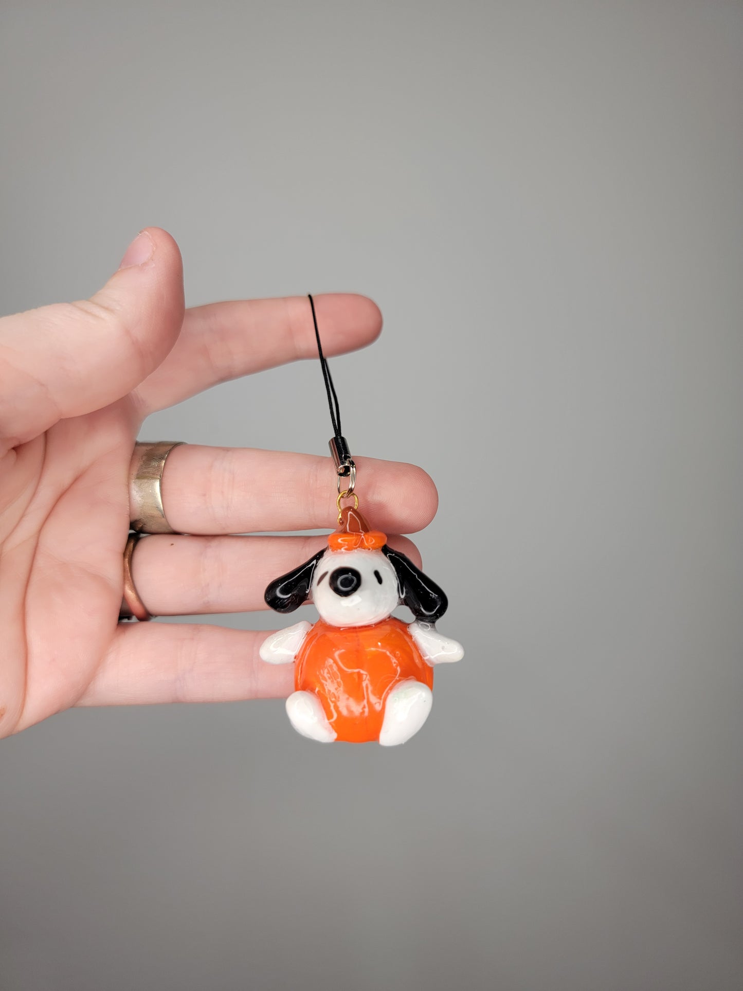 snoopy in a pumpkin phone strap