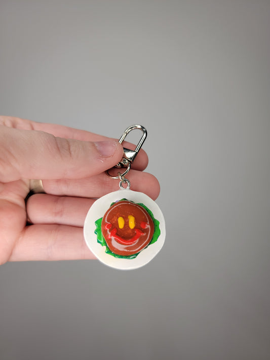 smiling patty keychain
