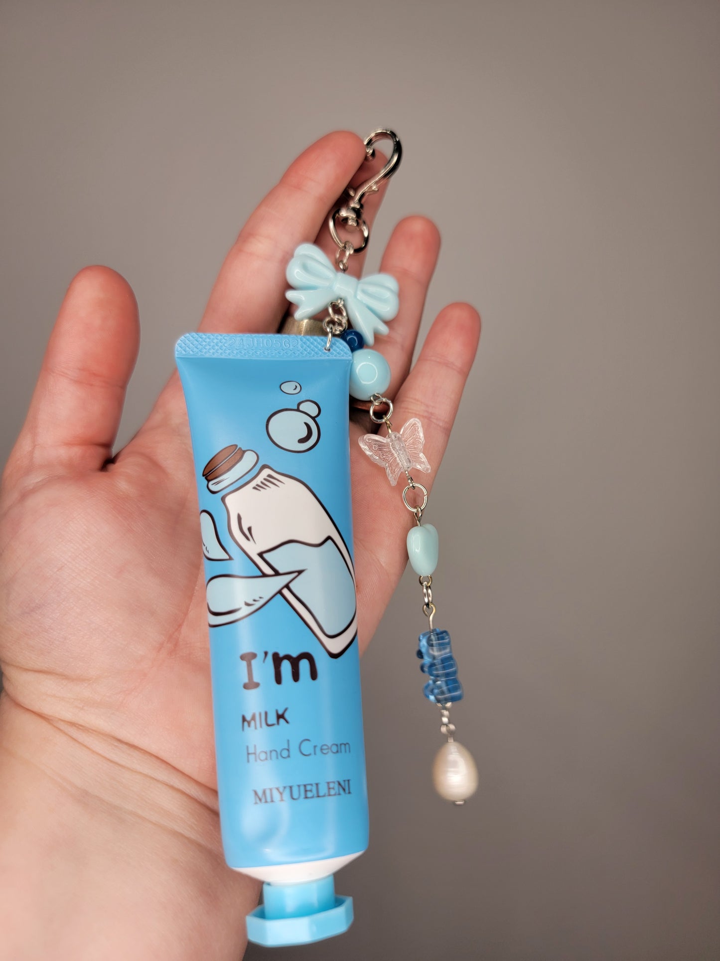 lotion charm keychain