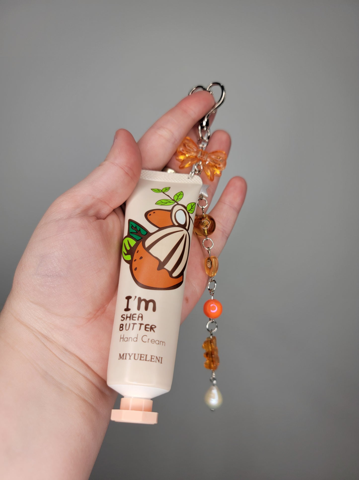 lotion charm keychain