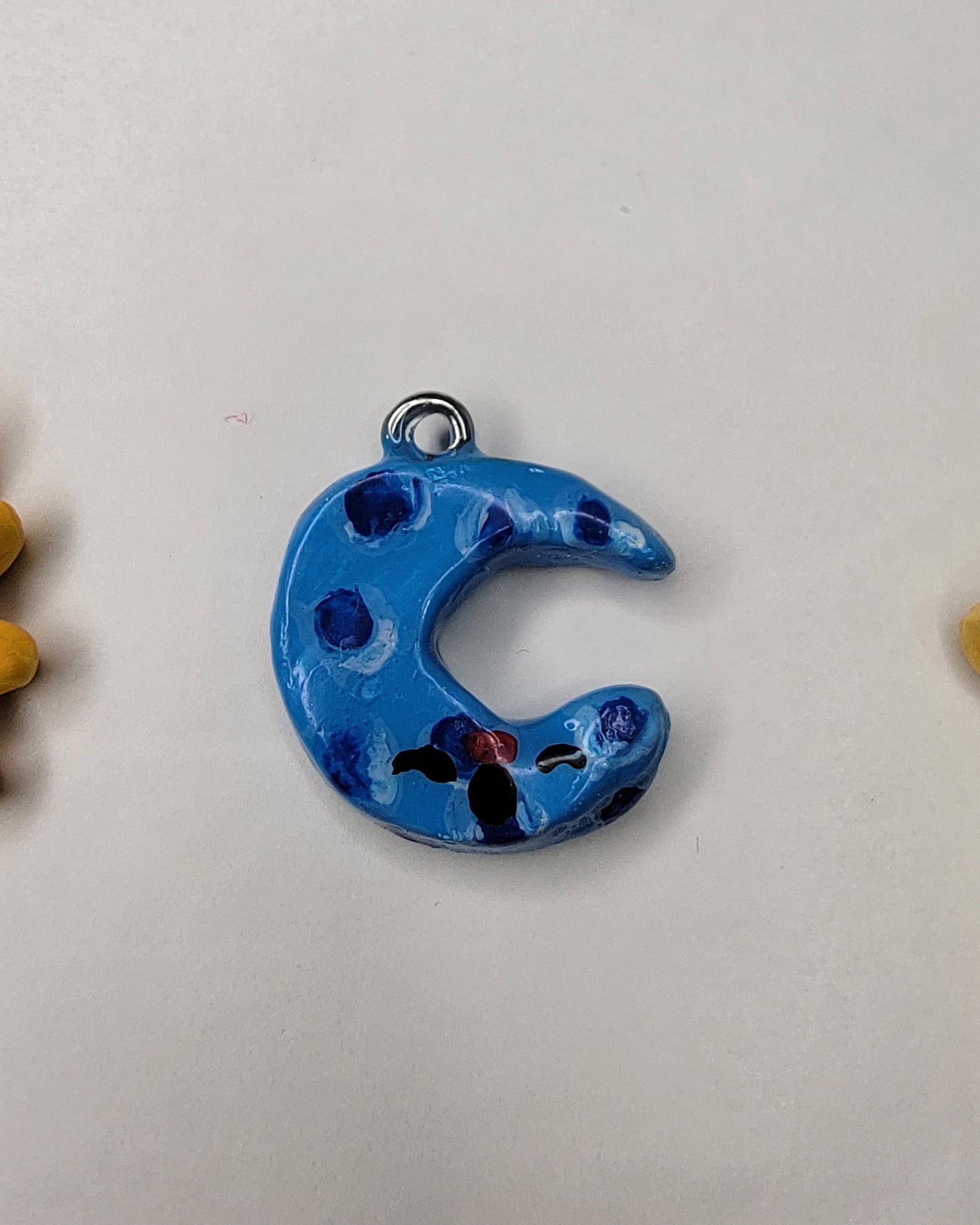 sun, moon, and star clay charms