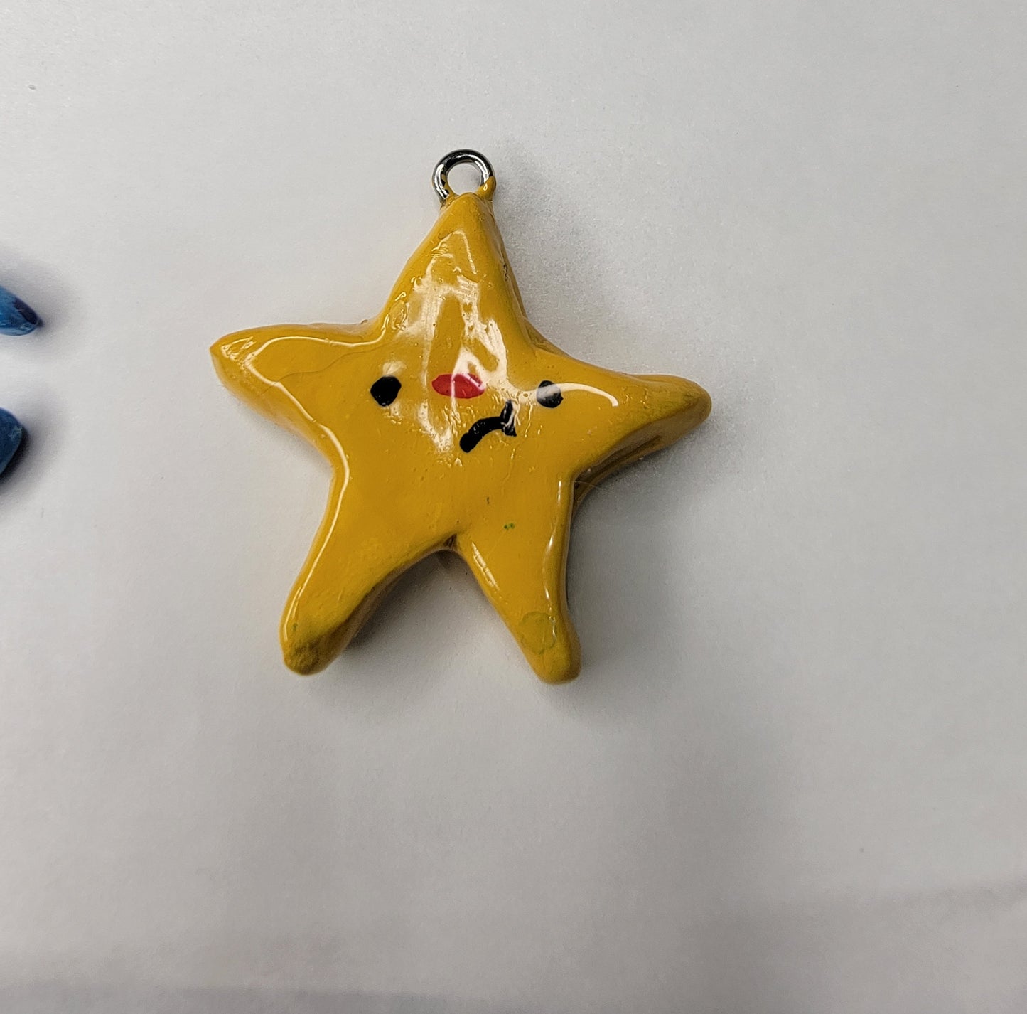 sun, moon, and star clay charms