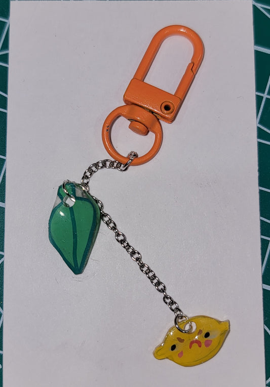 sour puss lemon keychain
