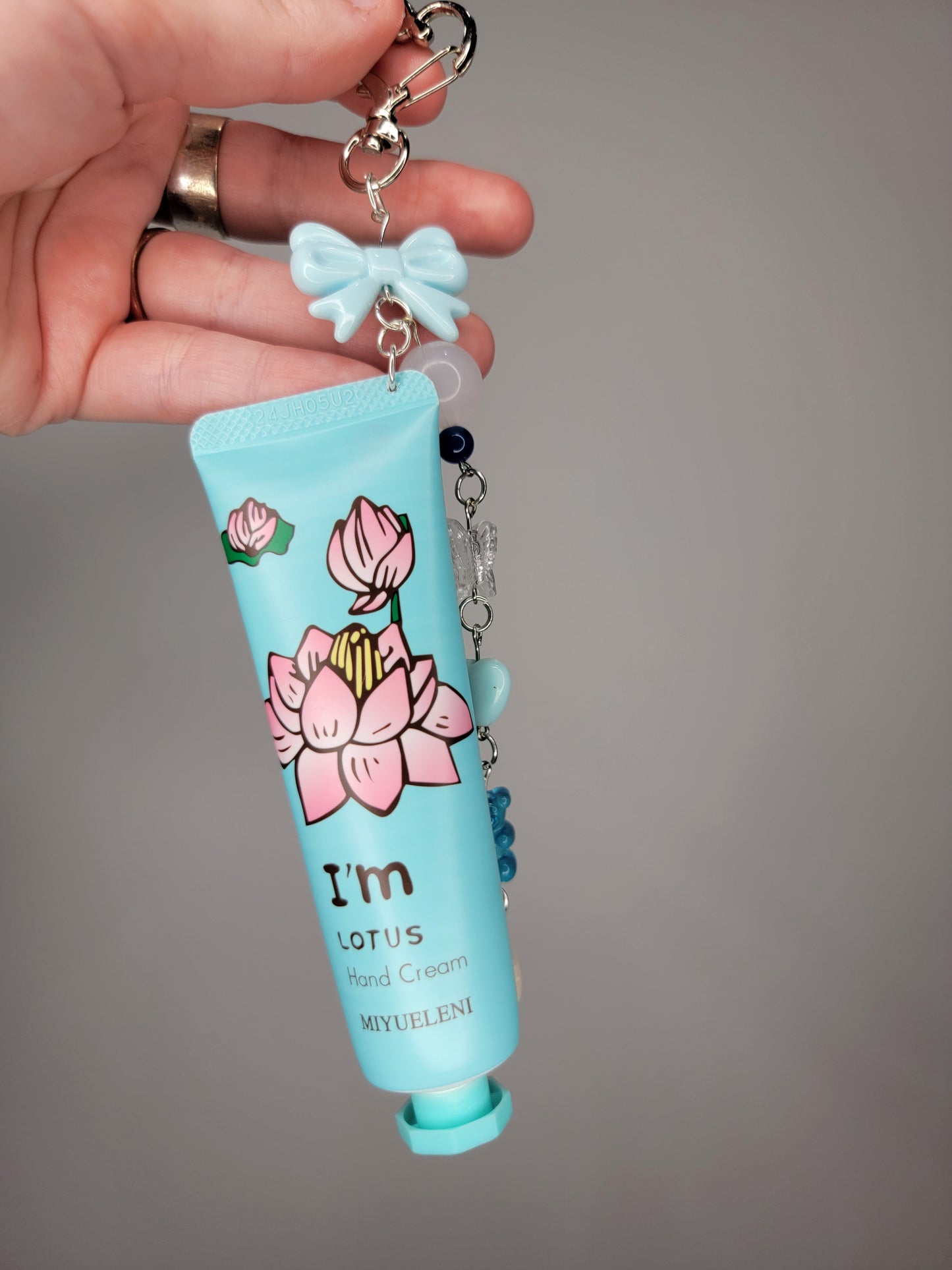 lotion charm keychain