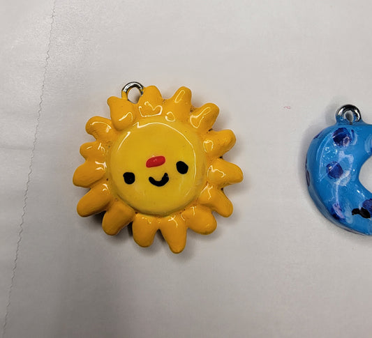 sun, moon, and star clay charms