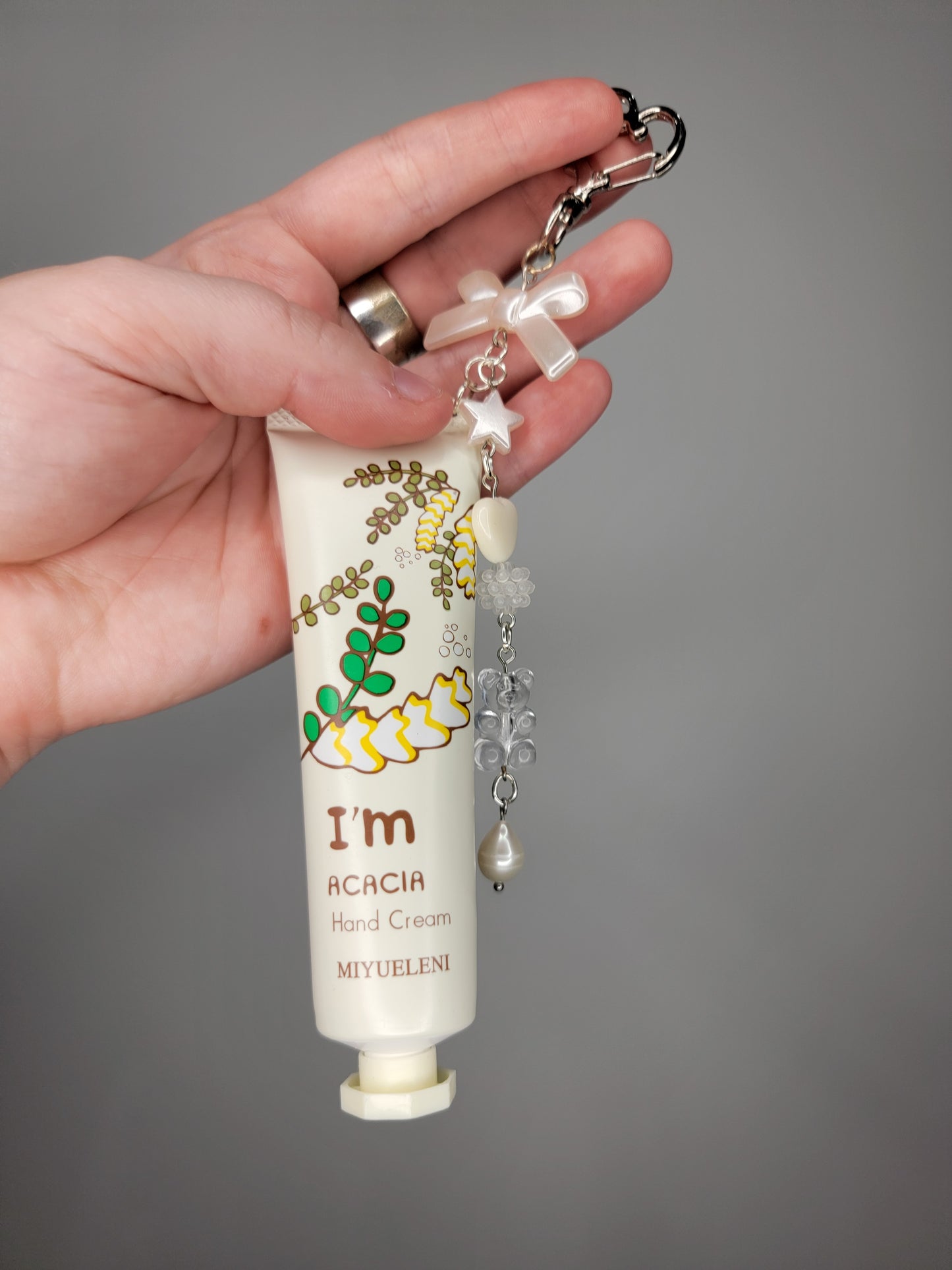 lotion charm keychain